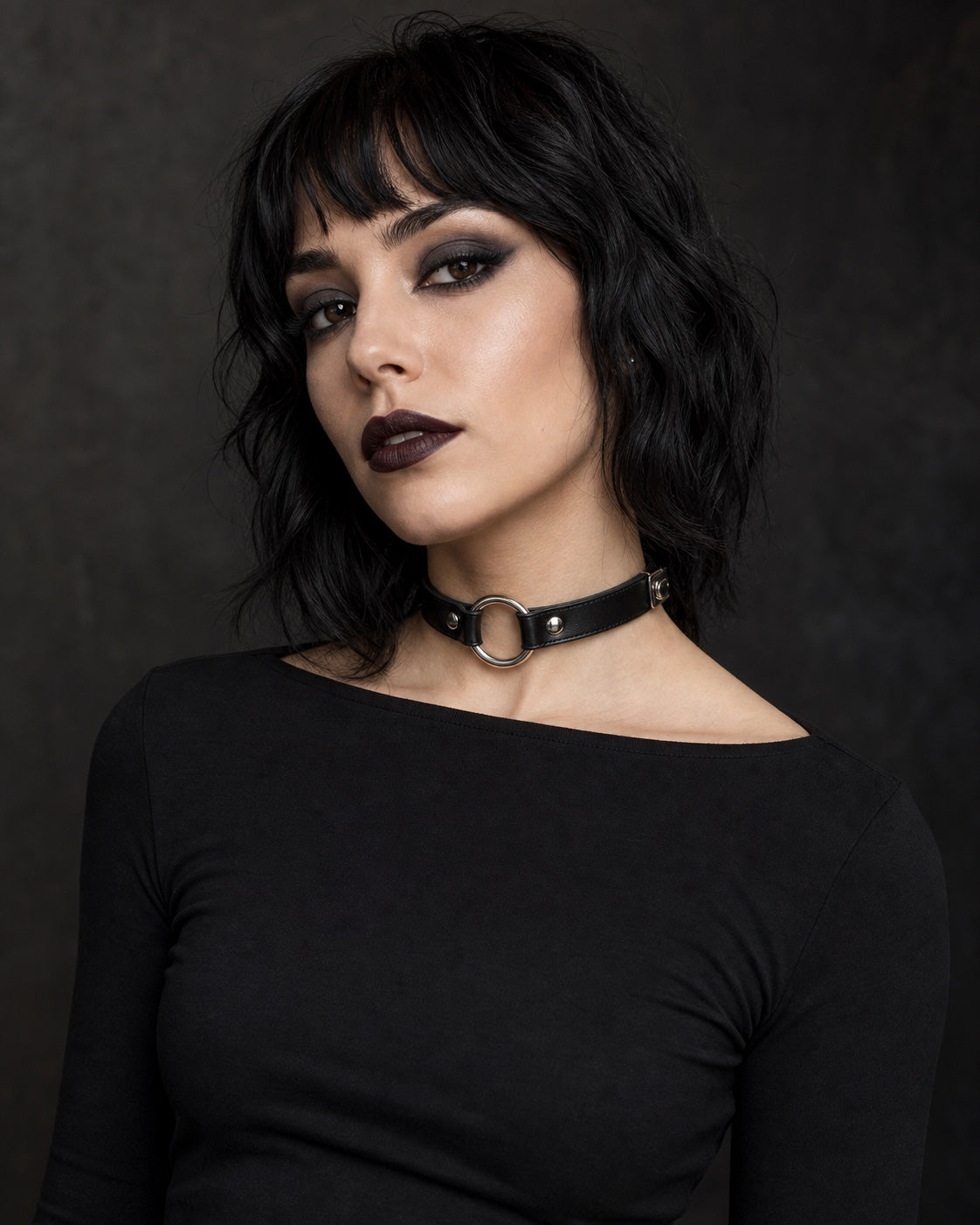 Model wearing a black leather O-ring choker