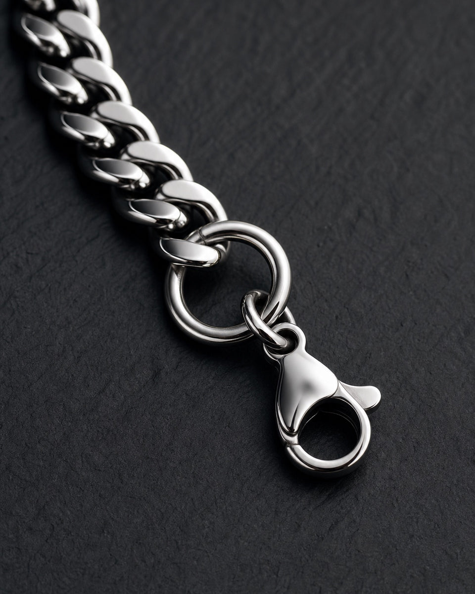 Macro detail of polished stainless steel chain and clasp